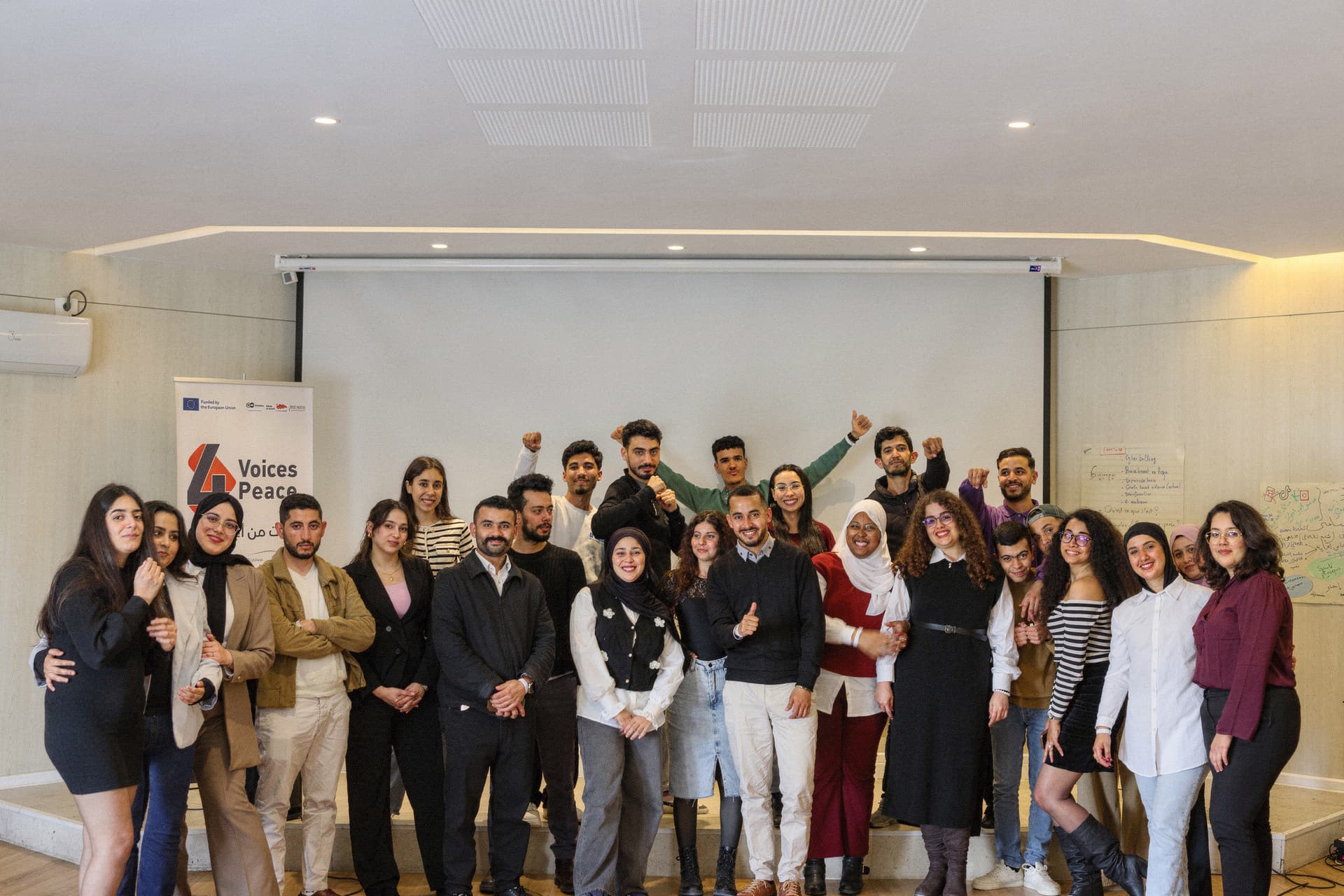 Group photo of youth participants at the end of a training programme